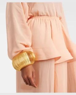 Alaïa Armreif Slinky Gold