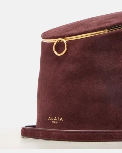 Alaïa Bucket Bag La Canette Small aus Veloursleder Burgunderrot