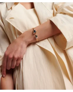 Armreif Nudo aus 18kt Roségold mit Diamanten und Topas Blau