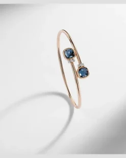 Armreif Nudo aus 18kt Rosé- und Weißgold mit Diamanten und London Blue Topas
