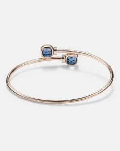 Armreif Nudo aus 18kt Rosé- und Weißgold mit Diamanten und London Blue Topas