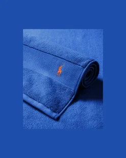 Das Polo-Handtuch und Badematte Blue