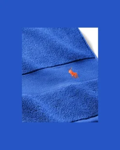 Das Polo-Handtuch und Badematte Blue
