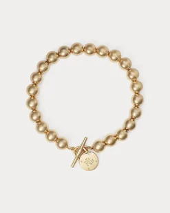 Goldfarbenes Perlenarmband mit Knebel