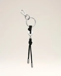 Schwarzer Schlüsselanhänger aus Metall mit Ami de Coeur Anhänger Unisex