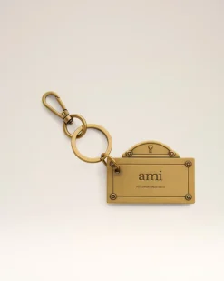 Street Schlüsselanhänger in Gold mit Plättchen Gelb Unisex GebüRstetes